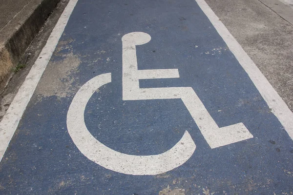 Red line of Wheel chair parking sign on road