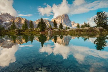 Tofana di Rozes reflected in the alpine Lake Limedes, Falzarego  clipart