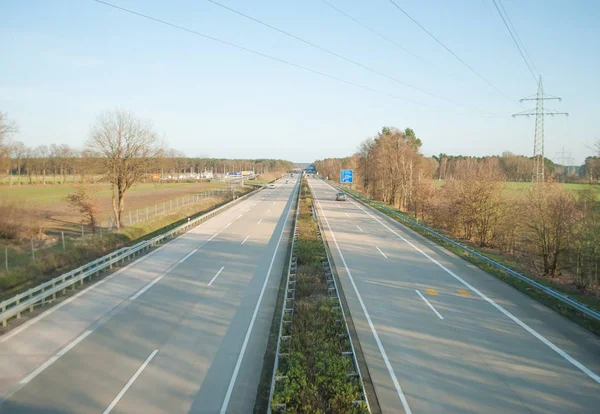 The autobahn, view from the bridge over the road, the movement of cars — Stock Photo, Image