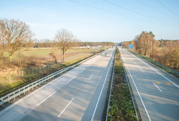 The cars going on the autobahn, a view from the bridge over the road — Stock Photo, Image