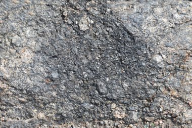 Fotokopi alanı ile gri renkli doğal taşımsı arka plan. Tasarımcılar için malzemeler, kayadan yapılmış boş duvar, afiş