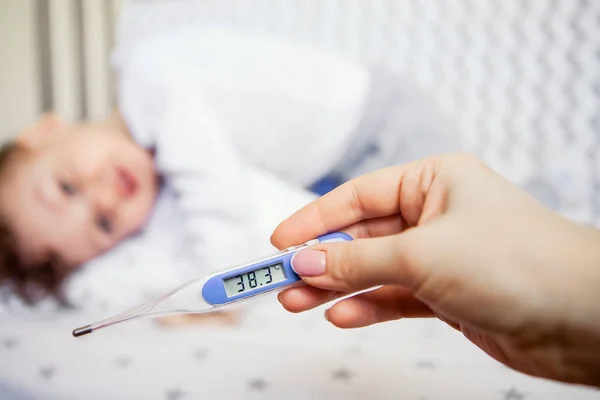 flu epidemic. Close-up of a high-temperature thermometer. health, medicine.