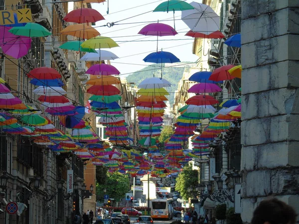 Beautiful coloured umbrellas over the city of Genova for the Euroflora event