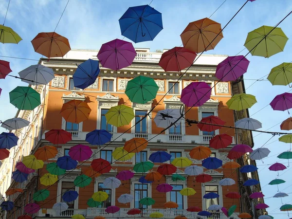 Beautiful coloured umbrellas over the city of Genova for the Euroflora event