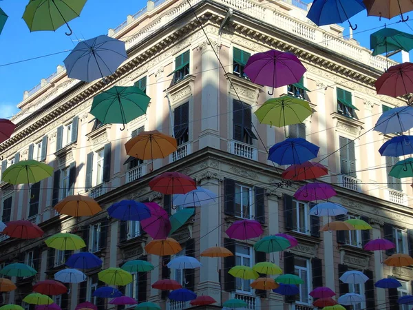 Beautiful coloured umbrellas over the city of Genova for the Euroflora event