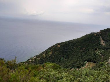 Portovenere, İtalya - 20.09.2019:Portovenere kasabasının fantastik bahar panoraması. Akdeniz' in muhteşem akşam sahnesi, Liguria, La Spezia eyaleti, İtalya, Avrupa. Seyahat konsepti arka planı.