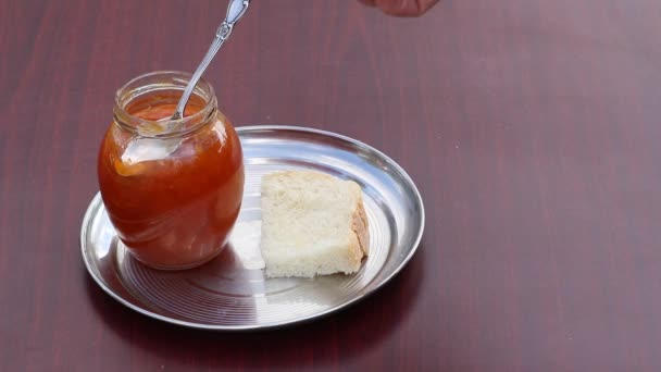 Jar Apricot Jam Stands Metal Plate Man Hand Lays Jam — Stock Video