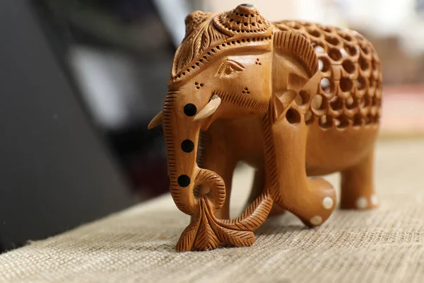Traditional Indian souvenir. Indian elephant.  Made of wood souvenir. Selective focus.
