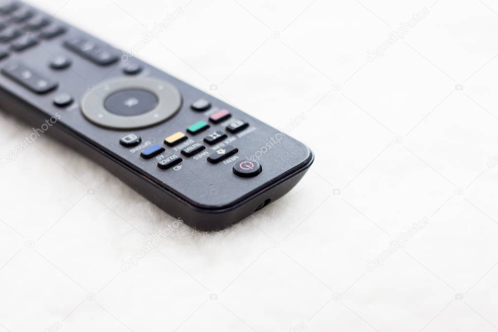 Small black unbranded TV remote control 