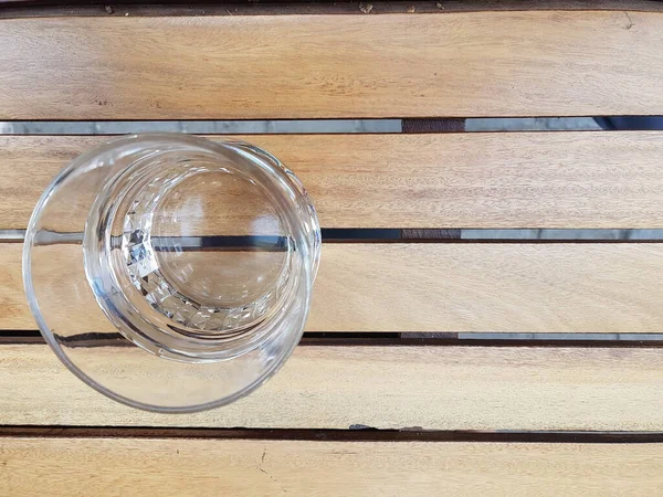 water glass top view on wooden table background