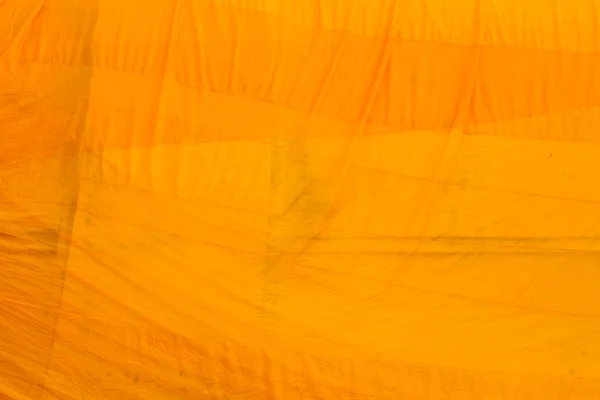 黄色面料纹理背景 佛教的象征 — 图库照片