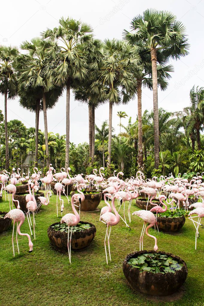 figures of flamingo birds in garden 