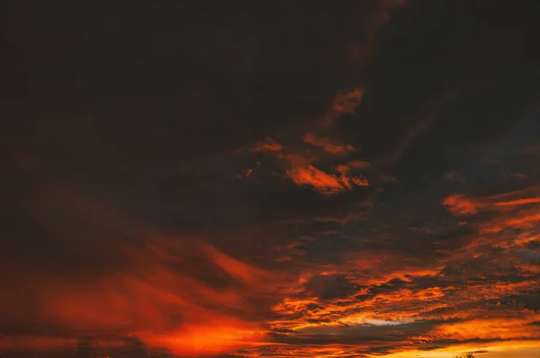 red sunset sky with clouds, cloudscape background
