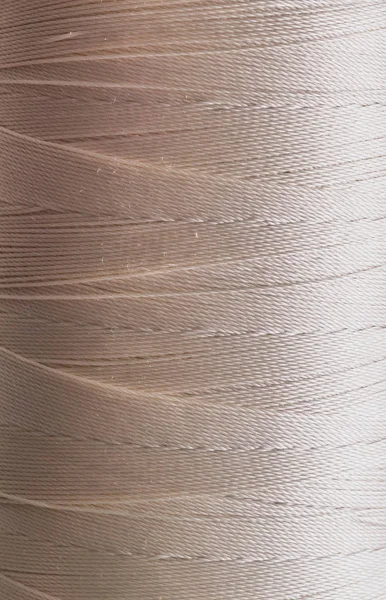 米色光全框架背景的螺纹线 — 图库照片