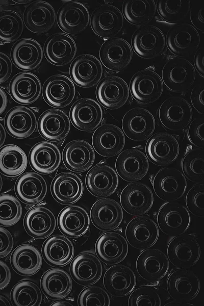 black photographic camera rolls, full frame vertical image