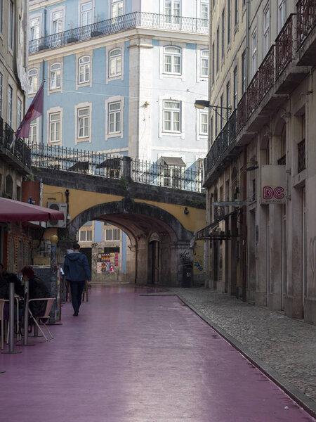 18 of Novwmber 2018Lisboa city in Portugal, pink road full of pubs historic and colored european city with a lot of tourists