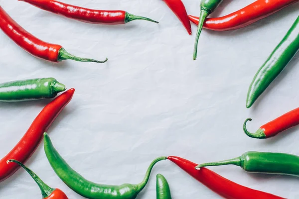 Top View Red Green Chili Peppers White Tabletop — Stock Photo, Image