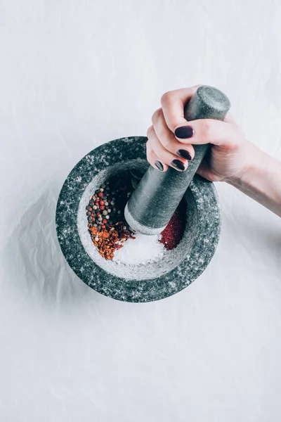 Cropped Image Woman Grinding Spices Mortar White Table — Stock Photo, Image