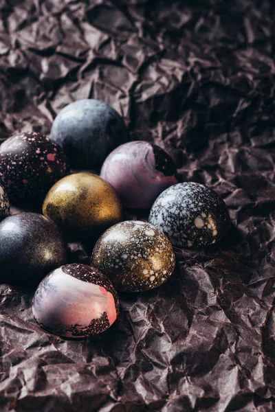 Pile Different Chocolate Candies Crumpled Paper — Free Stock Photo