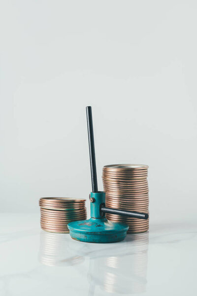 jar lids and tool for preparing preserved food on table