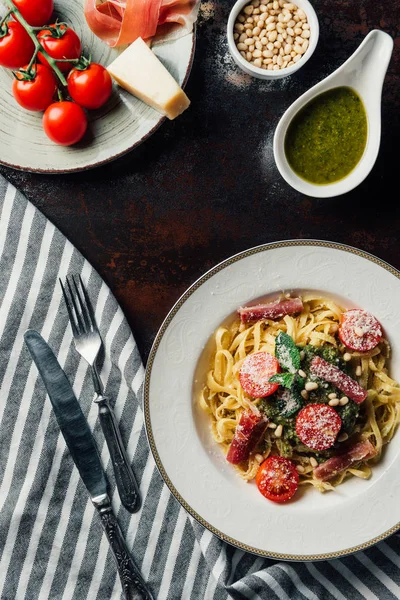 Top View Pasta Mint Leaves Jamon Cherry Tomatoes Covered Grated — Stock Photo, Image