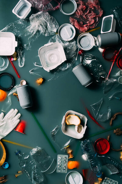 top view of trash and leftovers flowing in water, environment protection concept