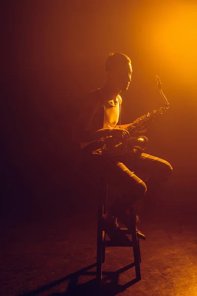 Young Stylish Jazzman Sitting Stool Holding Saxophone — Stock Photo, Image