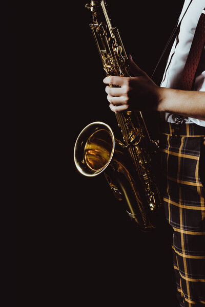 Cropped Shot Stylish Young Musician Holding Saxophone Isolated Black Royalty Free Stock Images