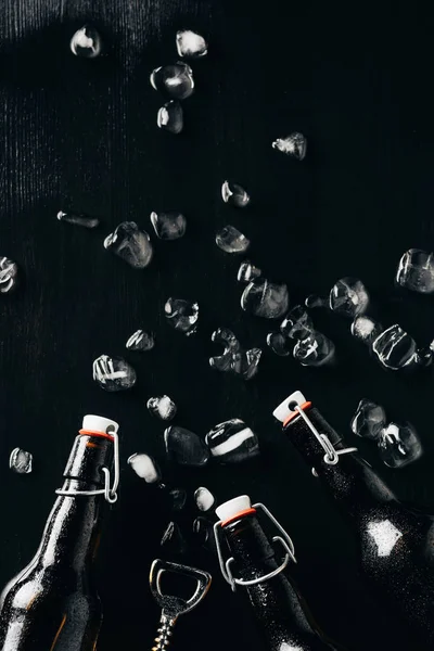 Flat Lay Bottle Opener Glass Bottles Beer Ice Cubes Arranged — Stock Photo, Image