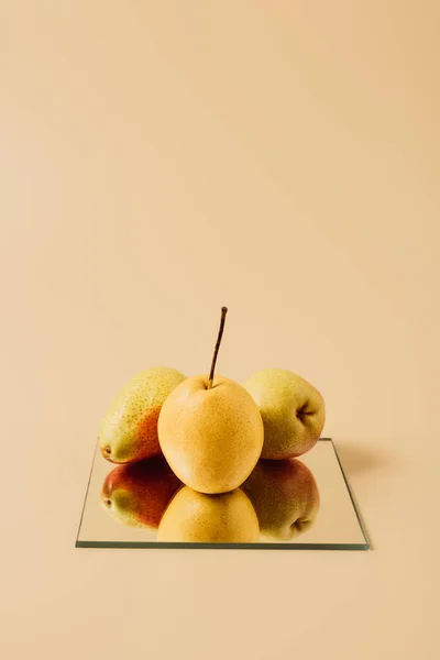 Three Pears Mirror Beige Tabletop — Stock Photo, Image