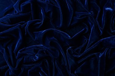 arka plan olarak koyu mavi kadife Tekstil üstten görünüm