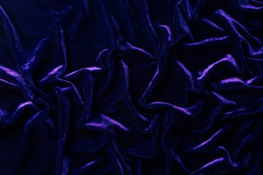 top view of stylish dark violet velvet textile as background clipart