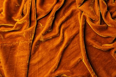 arka plan olarak turuncu kadife Tekstil üstten görünüm