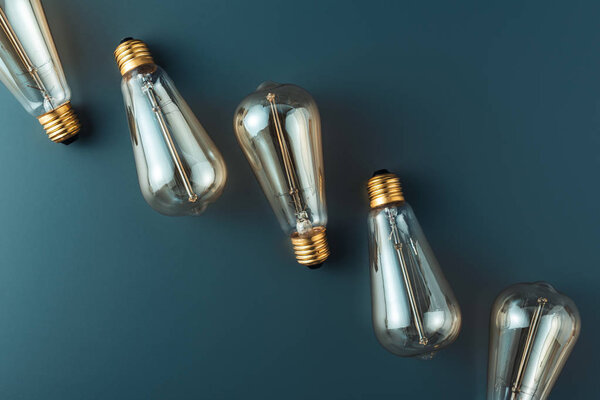 close-up view of light bulbs on grey background, energy concept 