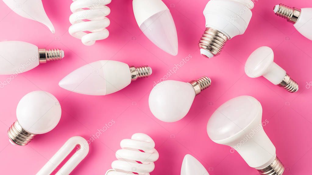 top view of pattern from various light bulbs on pink 