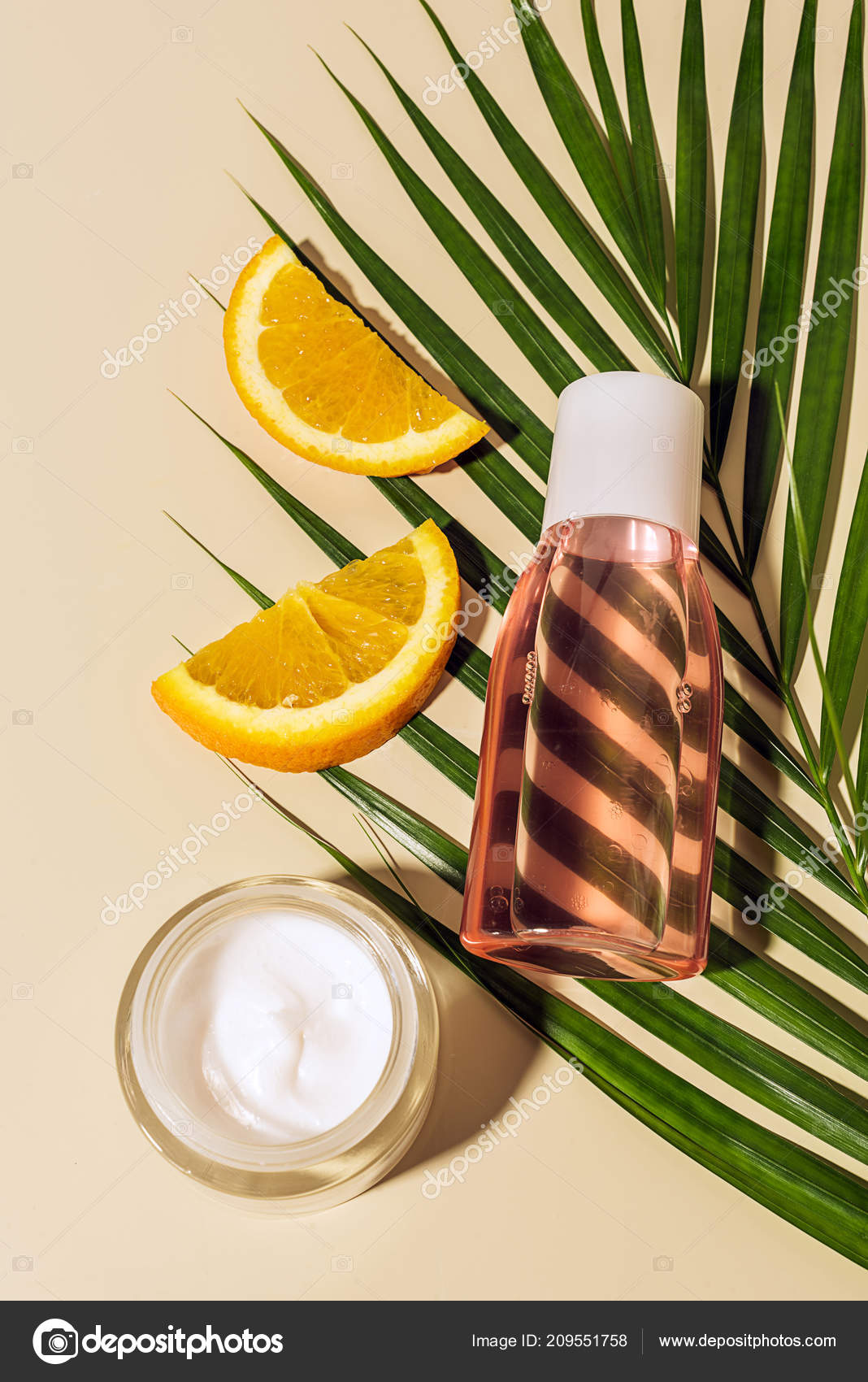 Top View Skin Care Products Orange Pieces Green Palm Leaf Stock Photo
