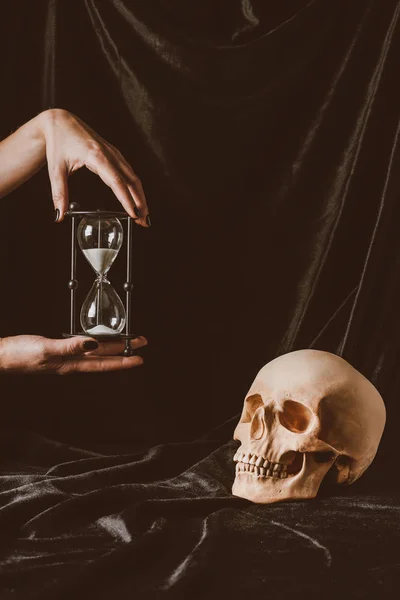 Cropped View Woman Holding Sand Clock Skull Black Cloth — Stock Photo, Image