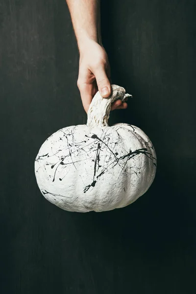 Cropped View Person Holding White Pumpkin Black Paint Splatters Hand — Free Stock Photo