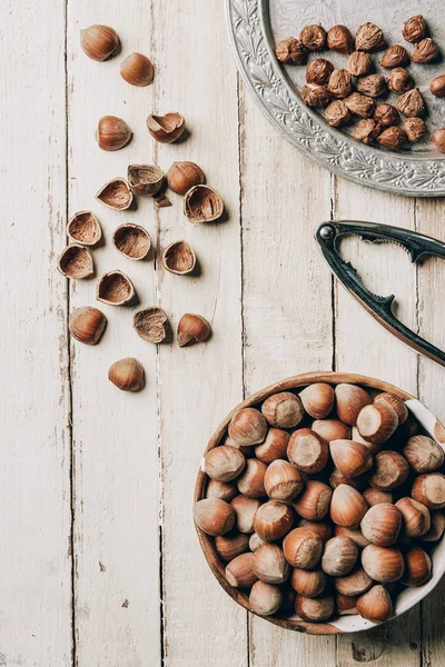 Top View Raw Ripe Hazelnuts Nutcracker Wooden Table — Stock Photo, Image