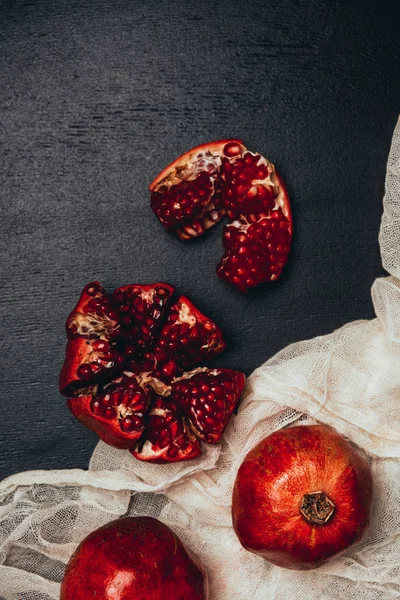 Flat Lay Gauze Fresh Garnets Arrangement Black Tabletop — Stock Photo, Image