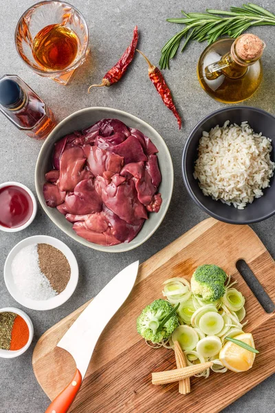 Top View Raw Meat Rice Spices Oil Cognac Peppers Broccoli — Stock Photo, Image