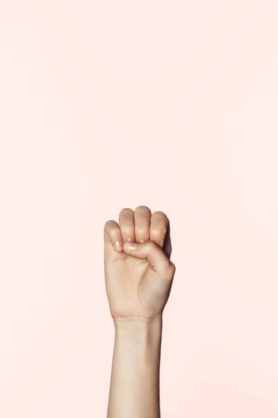 Partial view of woman gesturing by hand isolated on pink background — Stock Photo