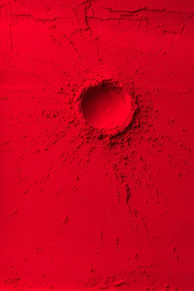 Vue de dessus de forme ronde sur poudre rouge — Photo de stock