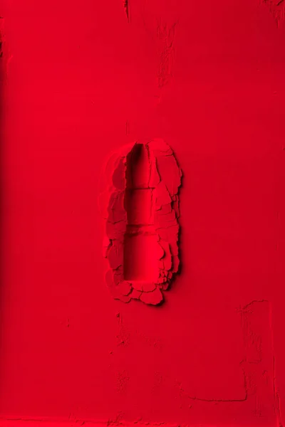Vista dall'alto di forma di rossetto su polvere rossa — Foto stock