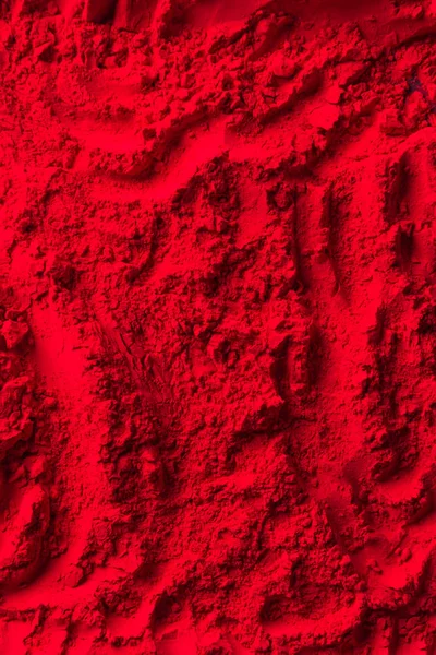 Vista superior da superfície do pó vermelho — Fotografia de Stock