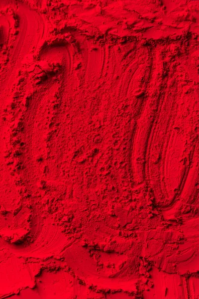 Vista elevada del fondo rojo en polvo - foto de stock