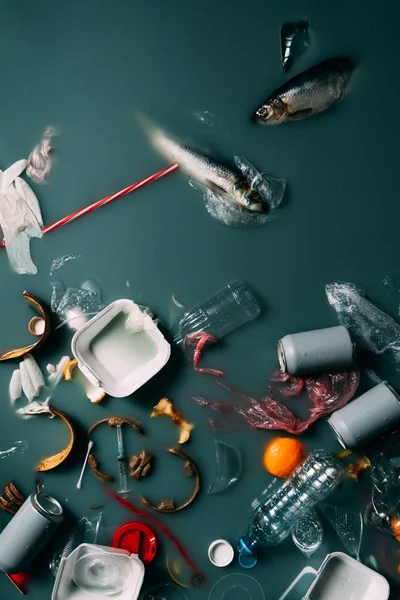 Top view of trash and leftovers flowing in water, environment protection concept — Stock Photo