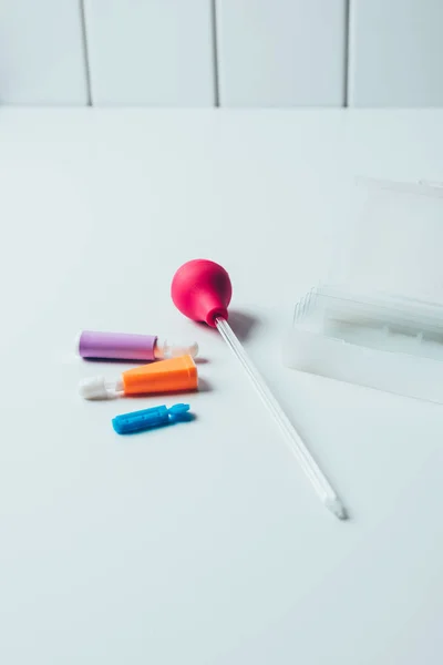 Close-up shot of blood test equipment on white table — Stock Photo