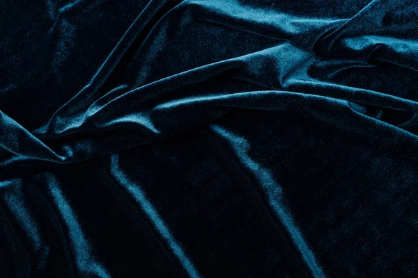 Vista superior de tecido de veludo turquesa escuro como fundo — Fotografia de Stock