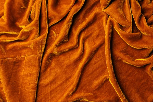 Draufsicht auf orangefarbenes Samttextil als Hintergrund — Stockfoto